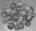 The Qumran Hoard of Silver Coins (People from Qumran used coins as we are using now. The coins were silver, and somebody was carved on the coins. The coins were used to pay tax, and payments to the Temple.)