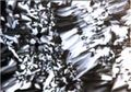 Mosaic/focal conic optical texture of type I hexagonal phase.