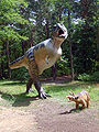 Tyrannosaur hunting triceratops.