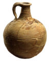 Jug (A jug had long thin neck, round shaped body, and a handle from top of the neck to the bottom of the neck.)